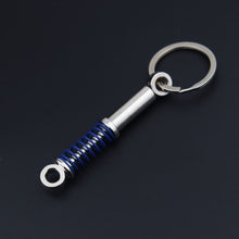 Load image into Gallery viewer, Creative gift car metal keychain turbo gear hub pendant brake disc shock absorber Pendant
